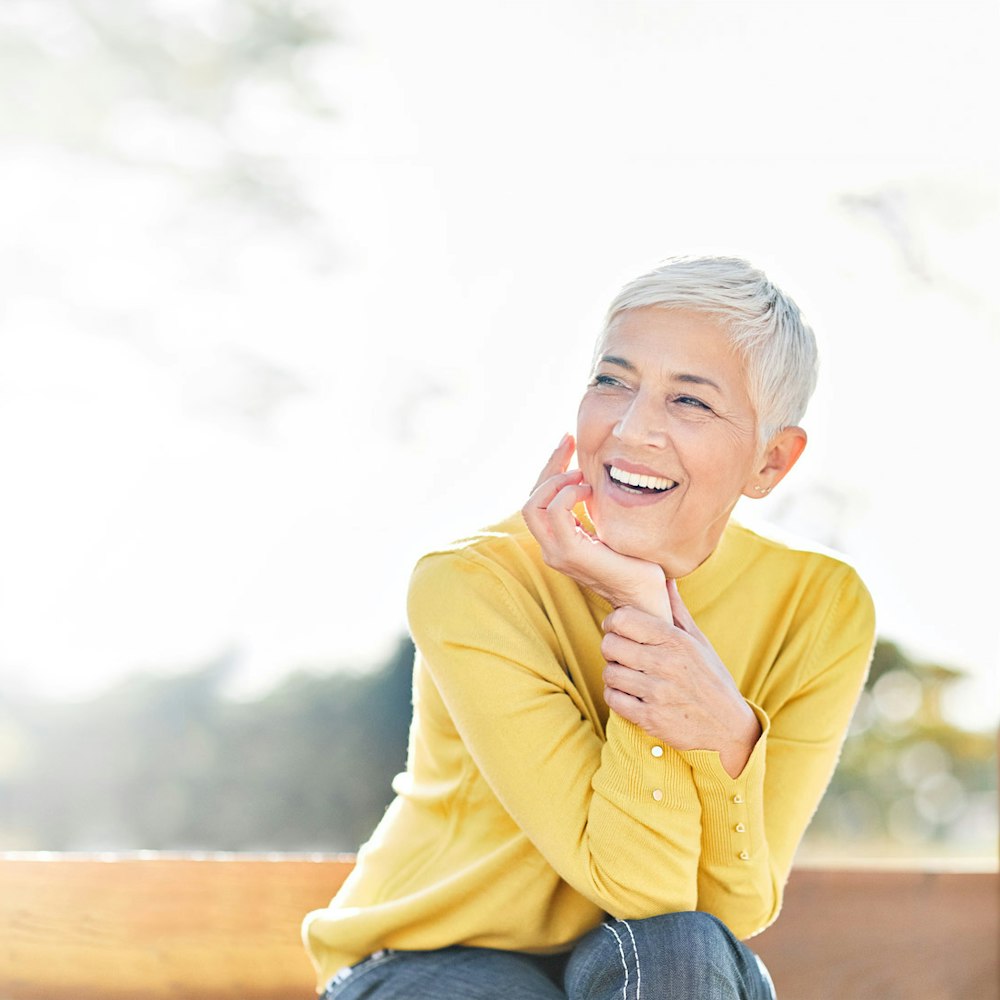 Smiling woman with All-on-4 implants