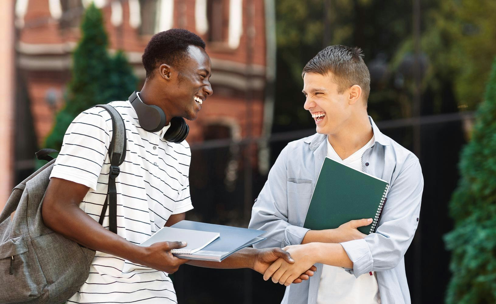 Two men laughing together