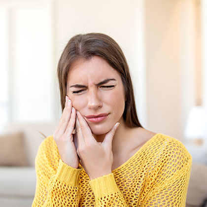 Young woman in dental pain