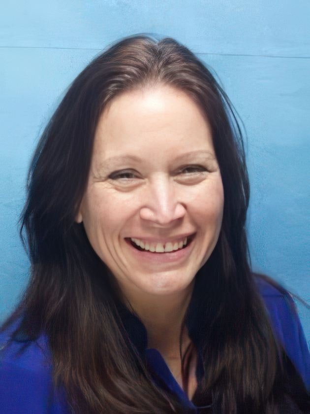 Smiling woman before smile makeover