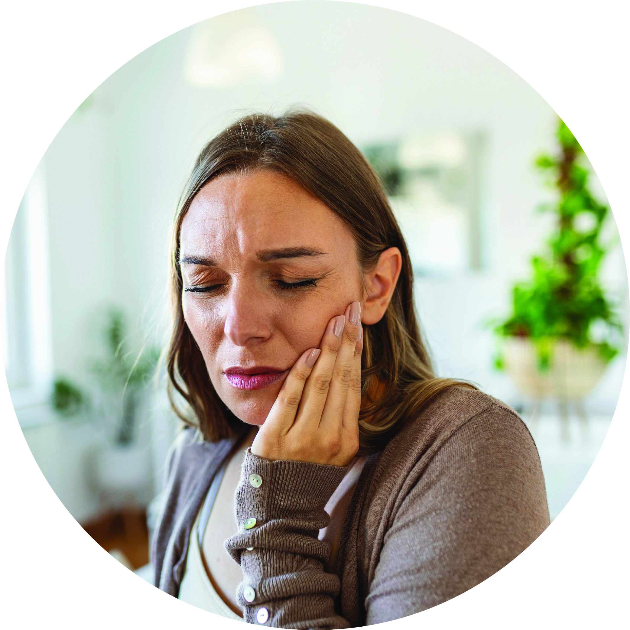 Woman in jaw pain