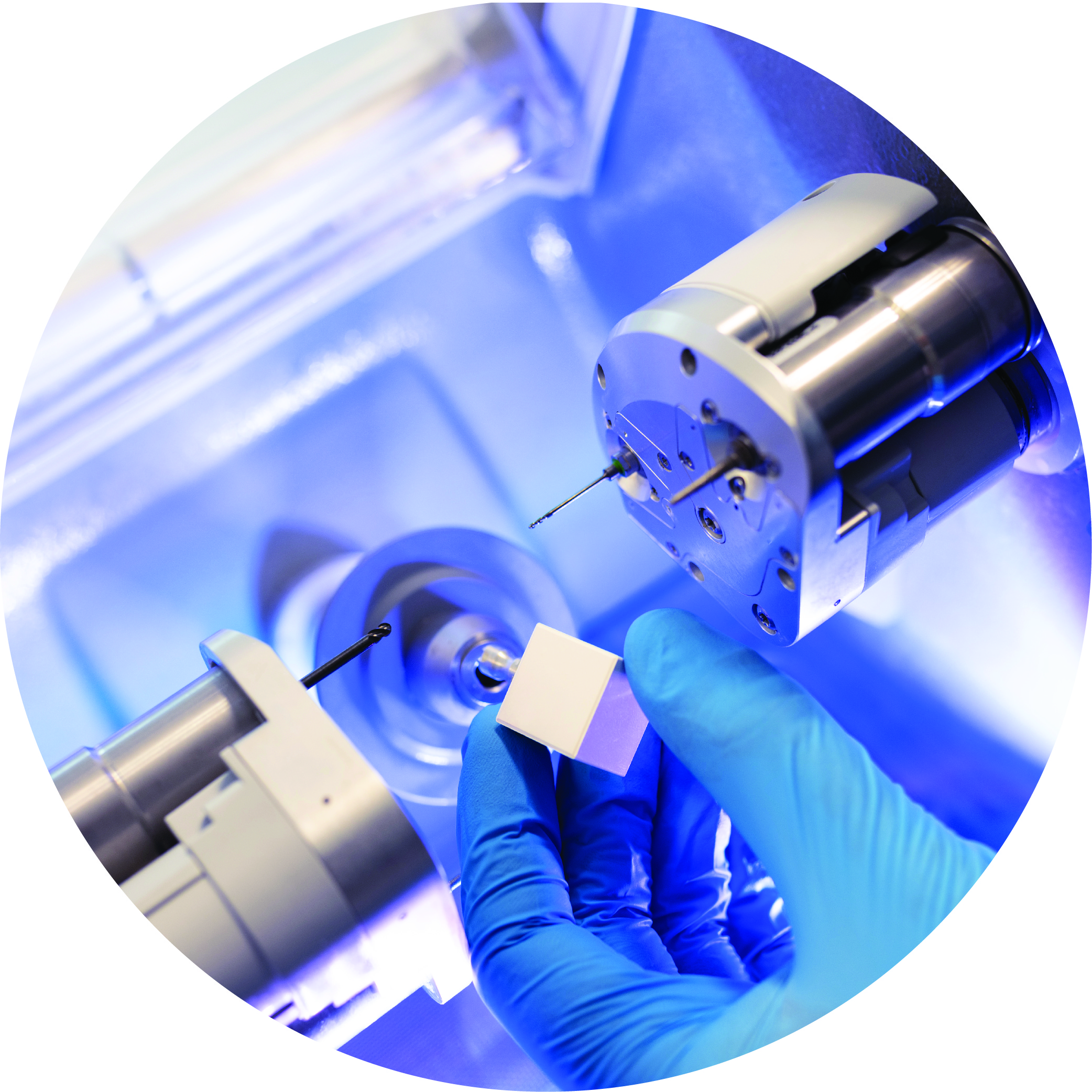 Dentist placing porcelain block in CEREC machine