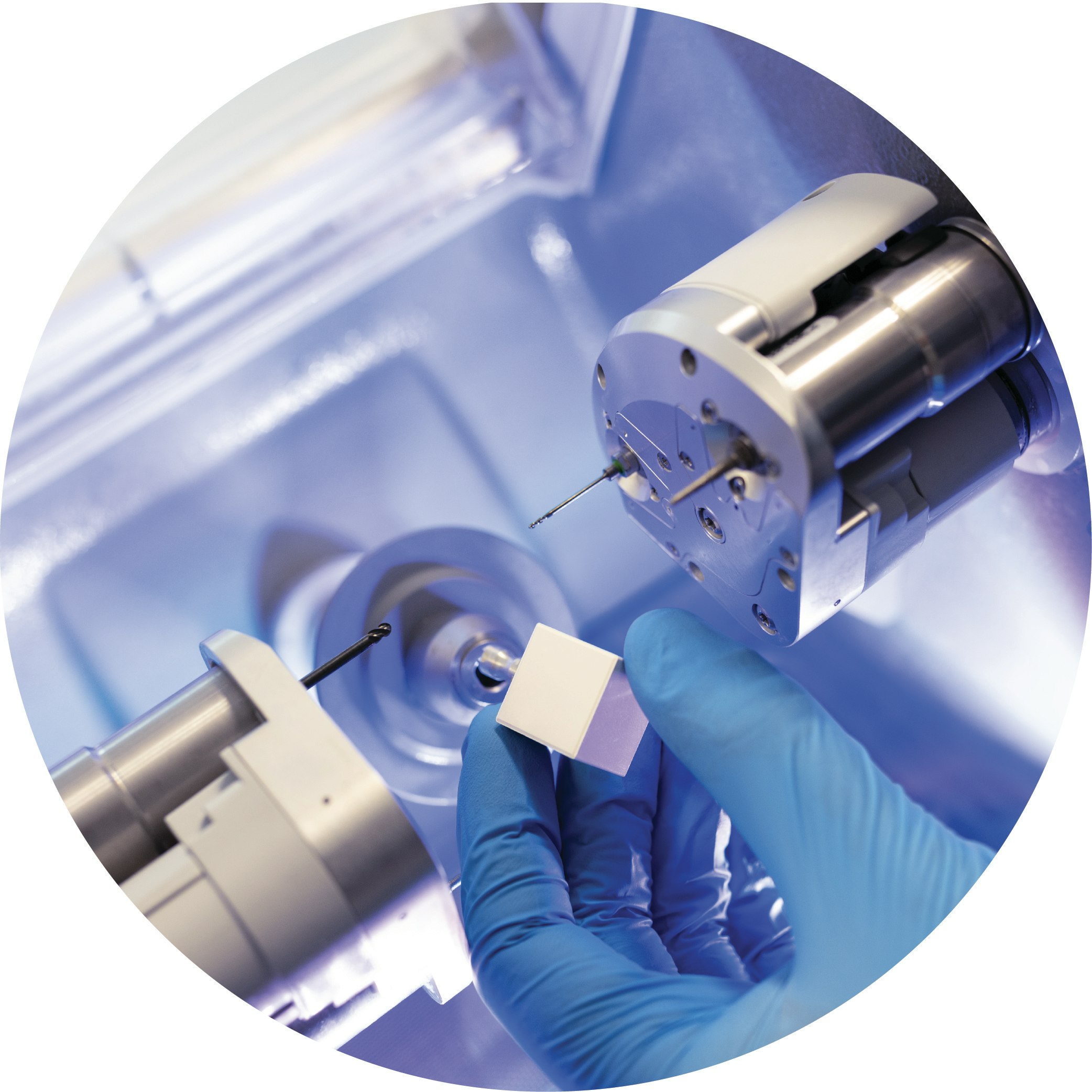 Dentist placing porcelain block in CEREC machine