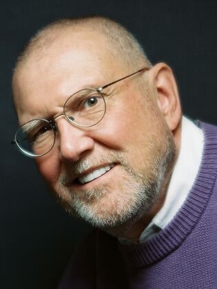 patient after dental implants with beautiful smile