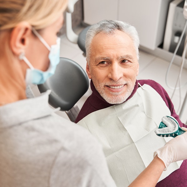 Senior man getting a dental mold