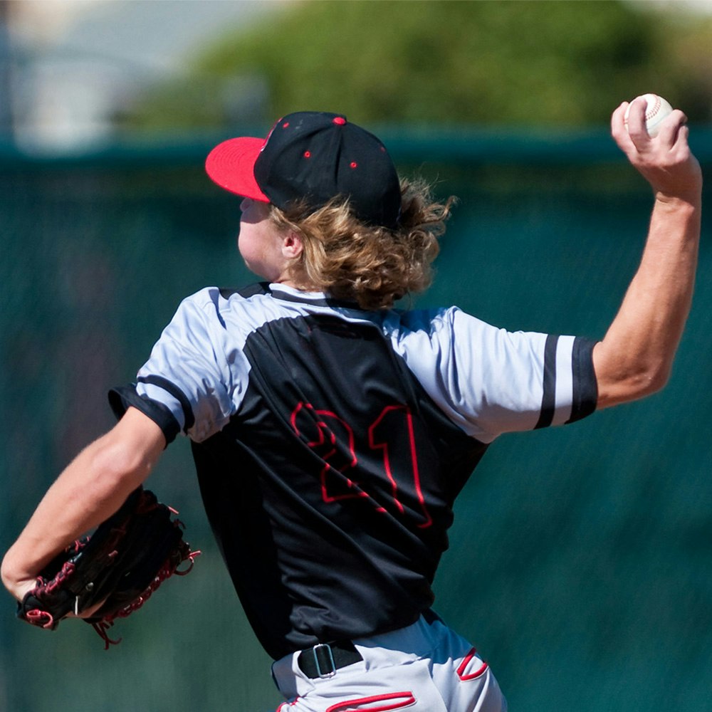 Baseball Player Mid-Pitch