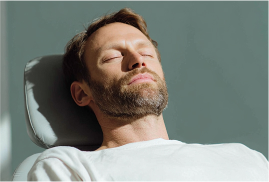 man relaxing with dental sedation