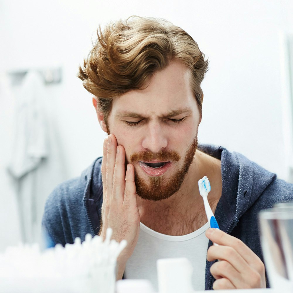 Man with a toothache