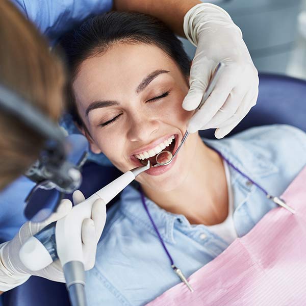 smiling patient in dental chair