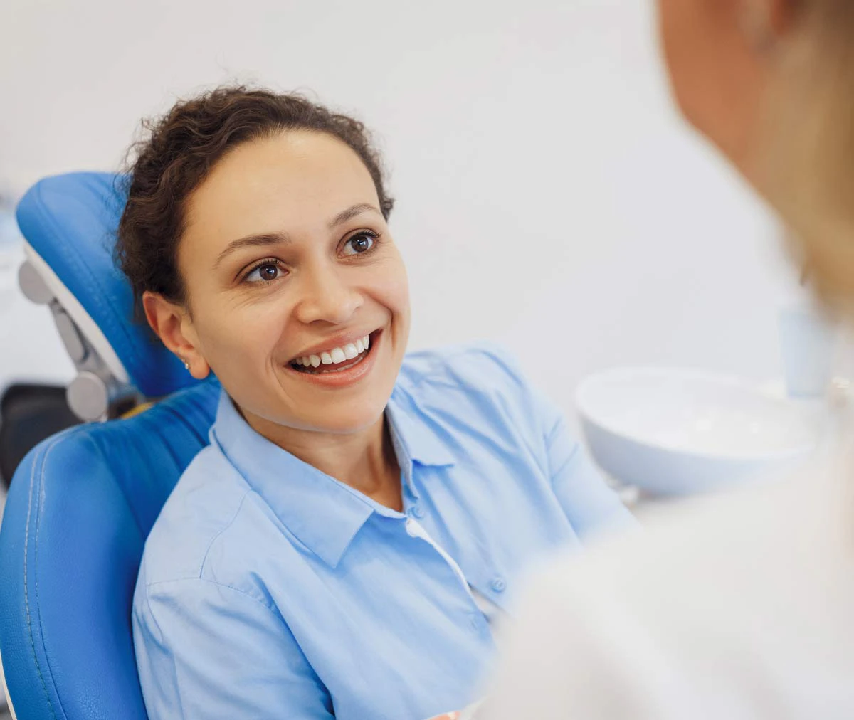 smiling woman in dentist