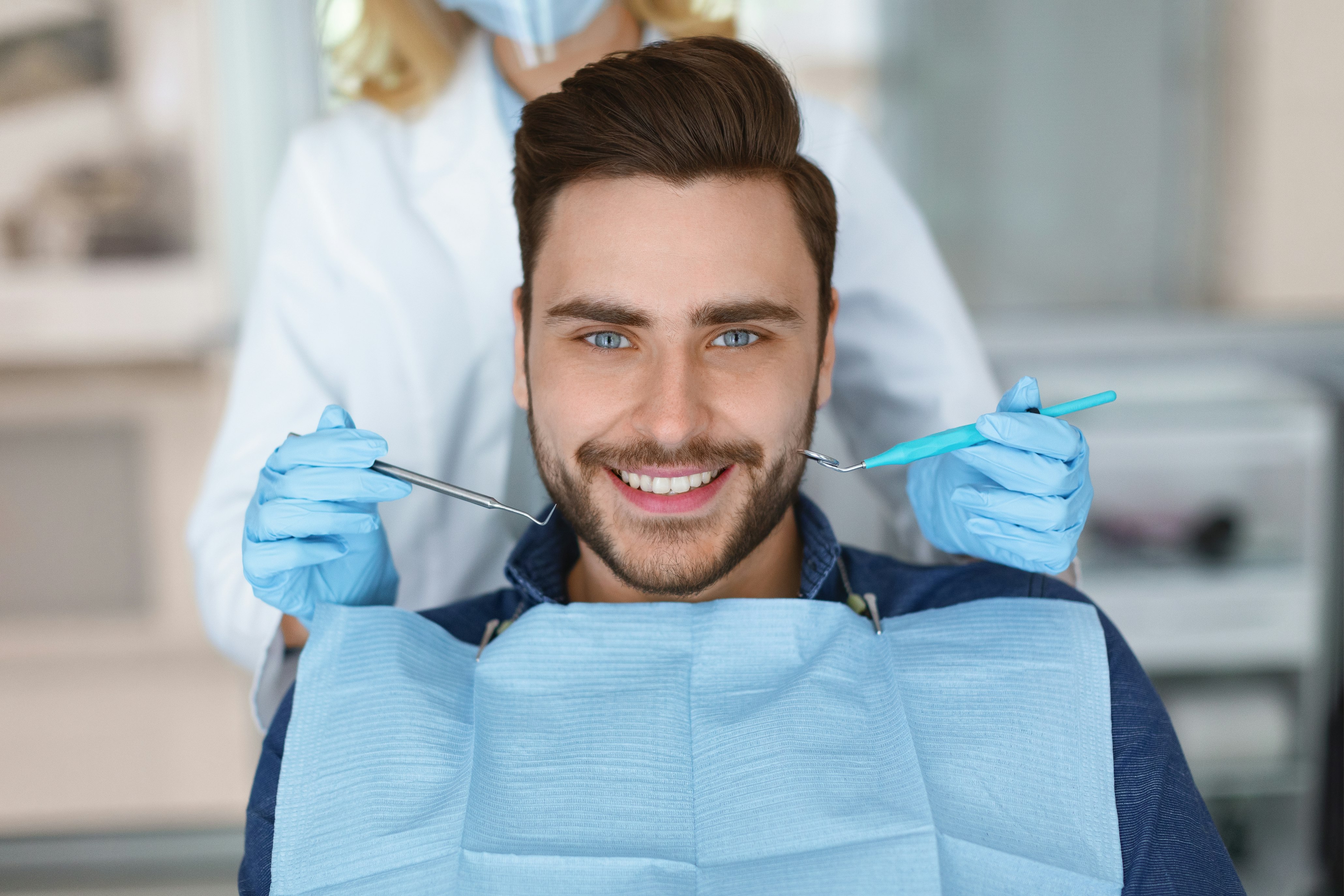 Smiling man at the dentist