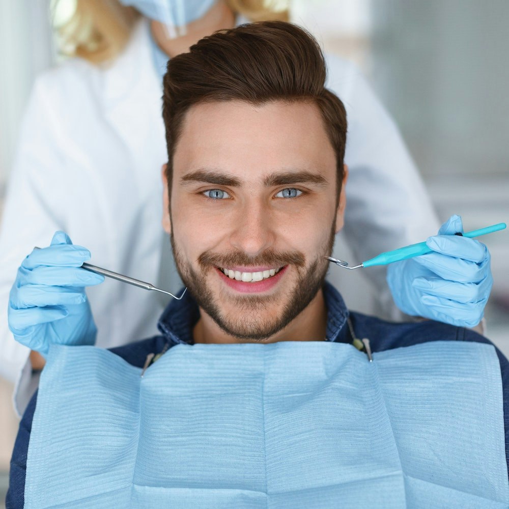 Smiling man at the dentist