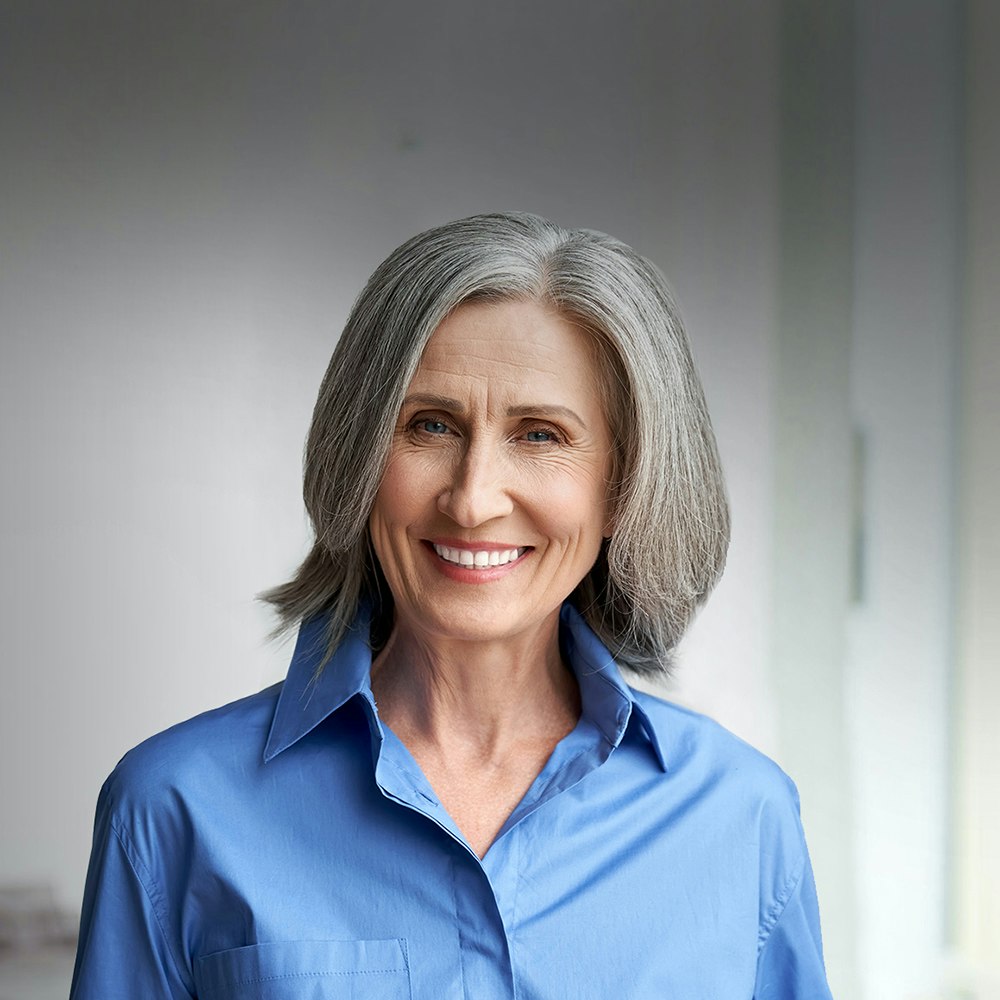 Smiling dental bridge patient
