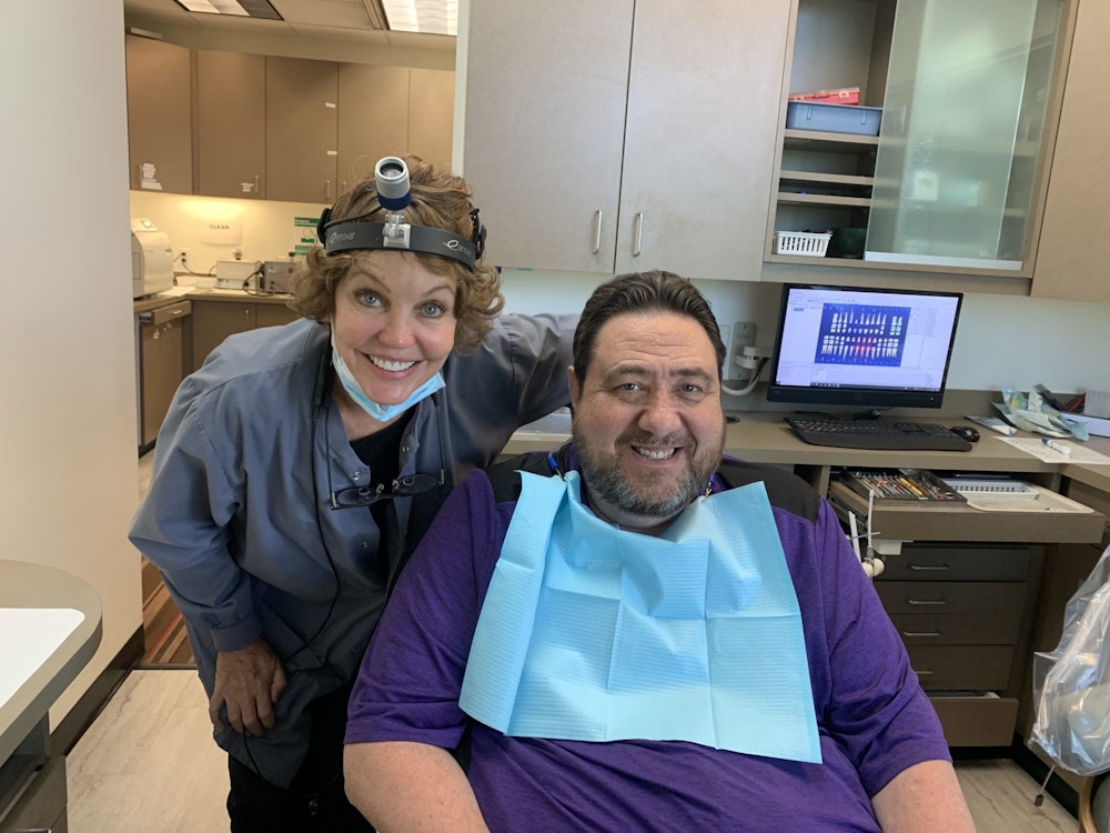 Dr. Jean Link smiling with a patient