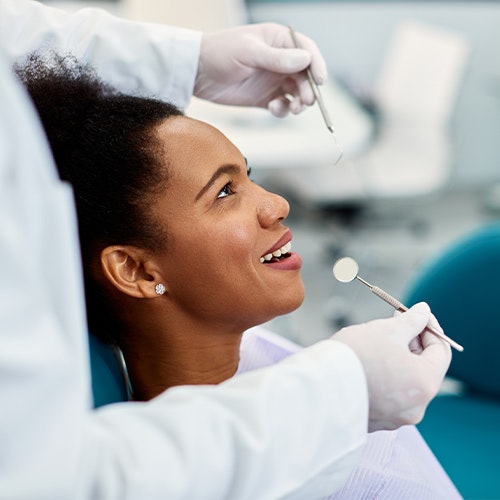 A woman getting a dental exam