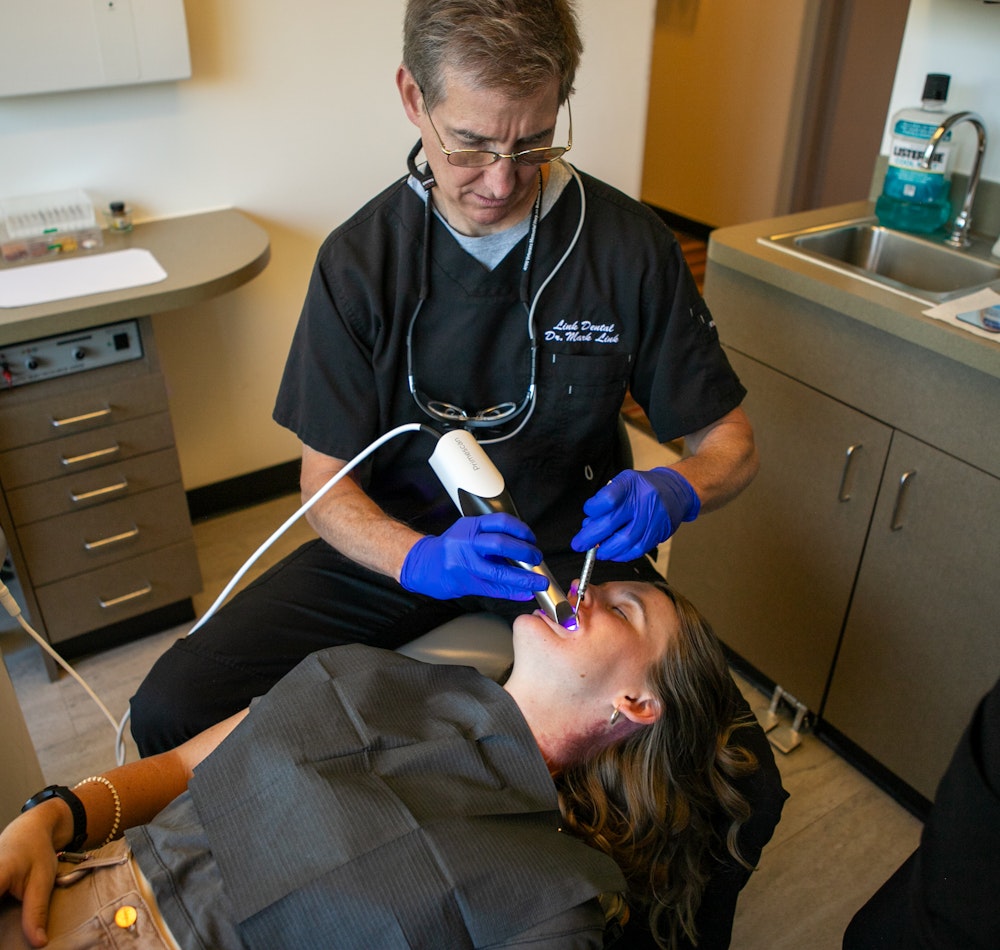 Dr. Mark Link with patient under sedation