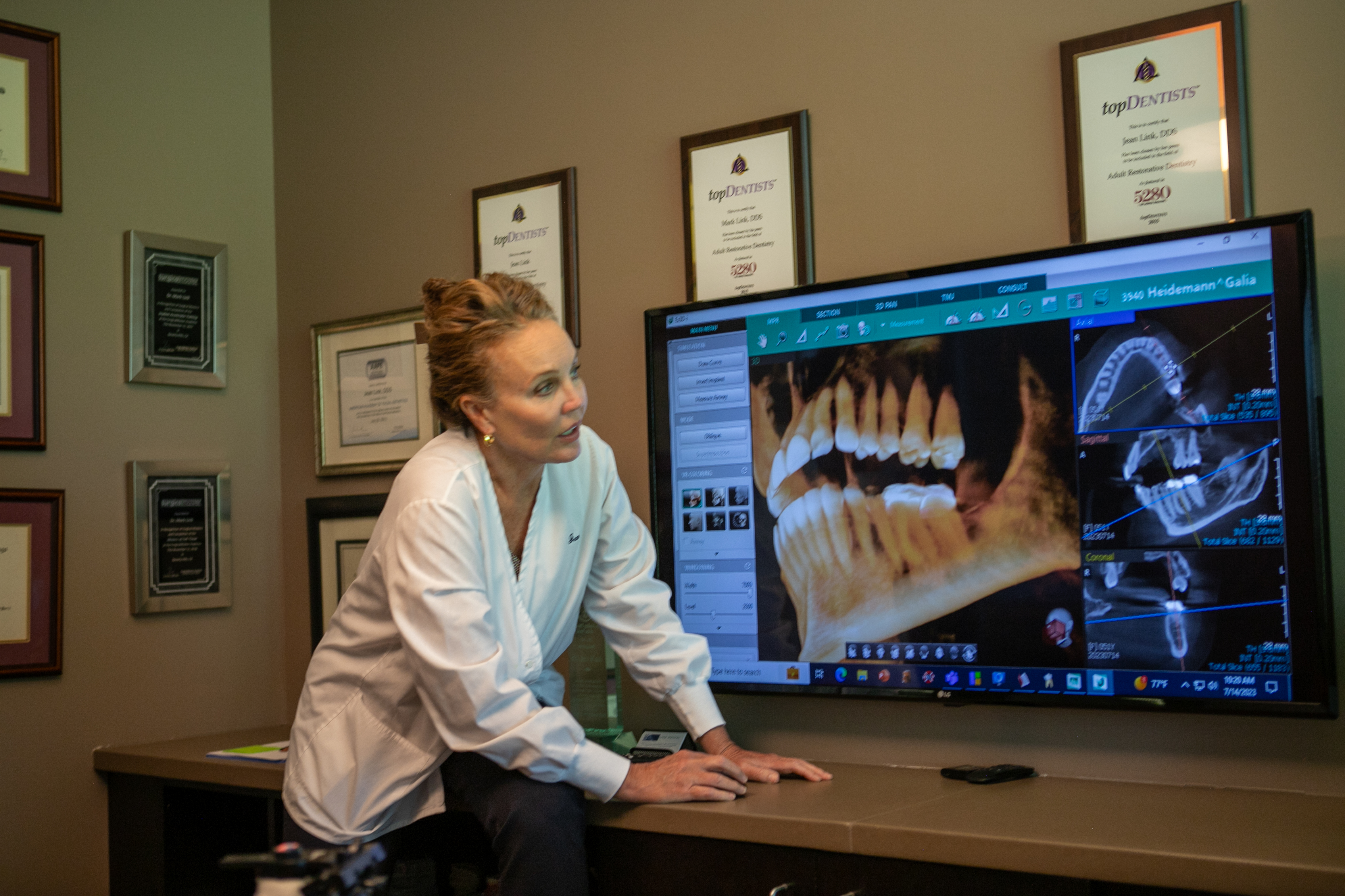 Dr. Jean Link looking at an x-ray