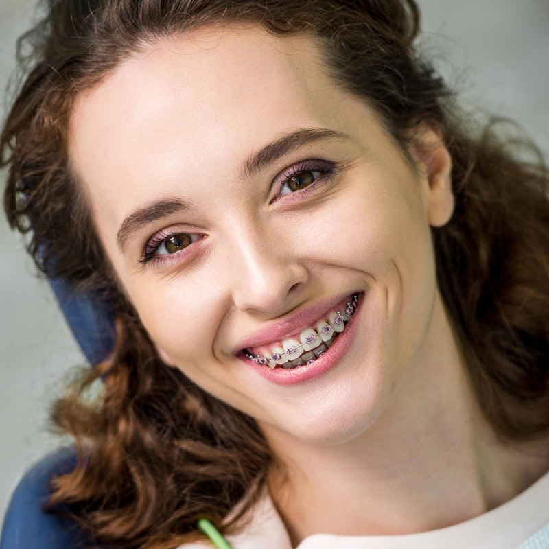 orthodontics smiling in chair