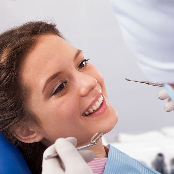 Girl getting a dental exam