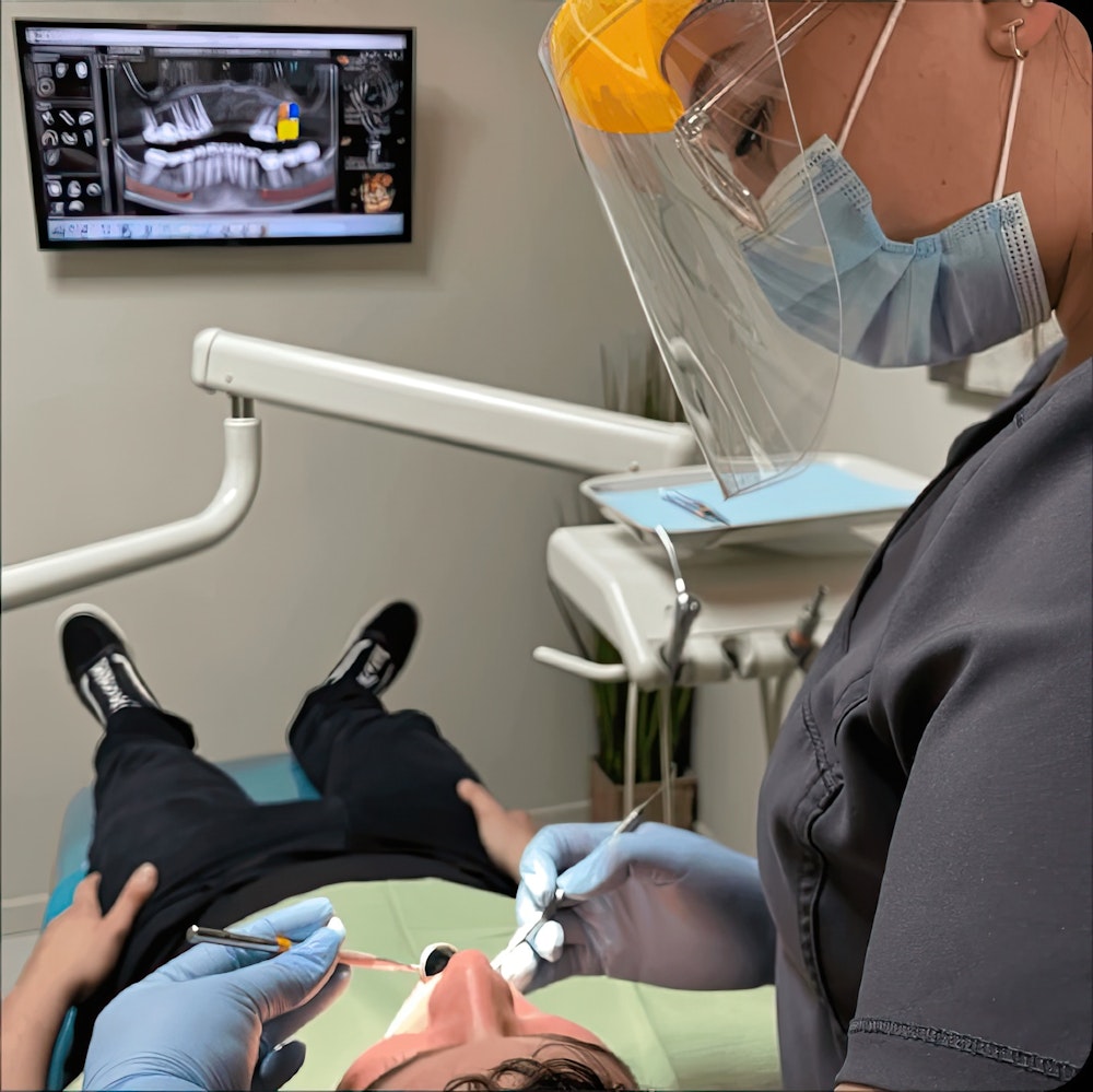 Loval Dental patient working on client