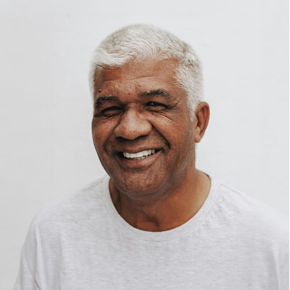 Smiling mature man with All-on-4 implants