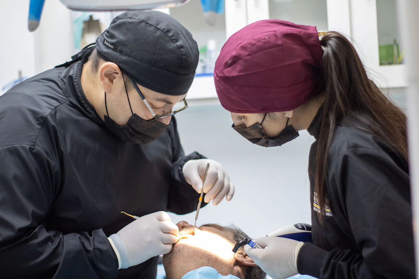 our dentists working on a patient