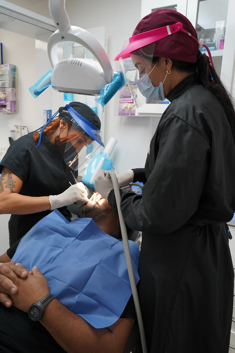 Castle Dental team with a patient