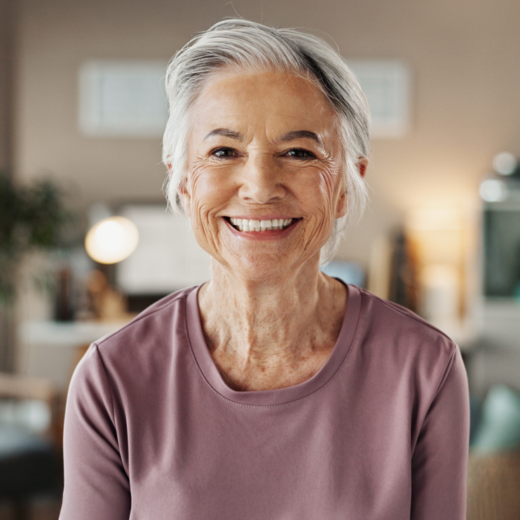 Smiling woman with dental implants