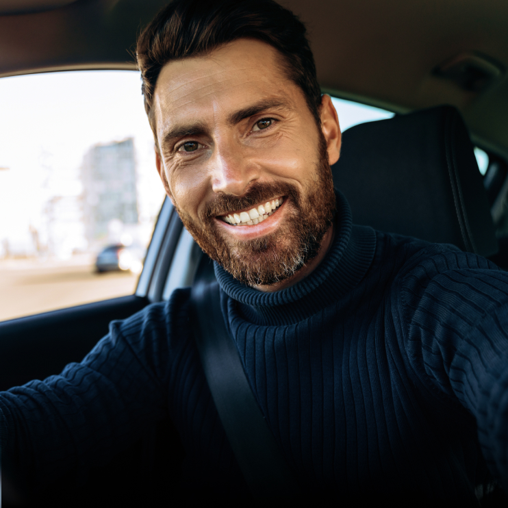 Smiling man with dental crowns