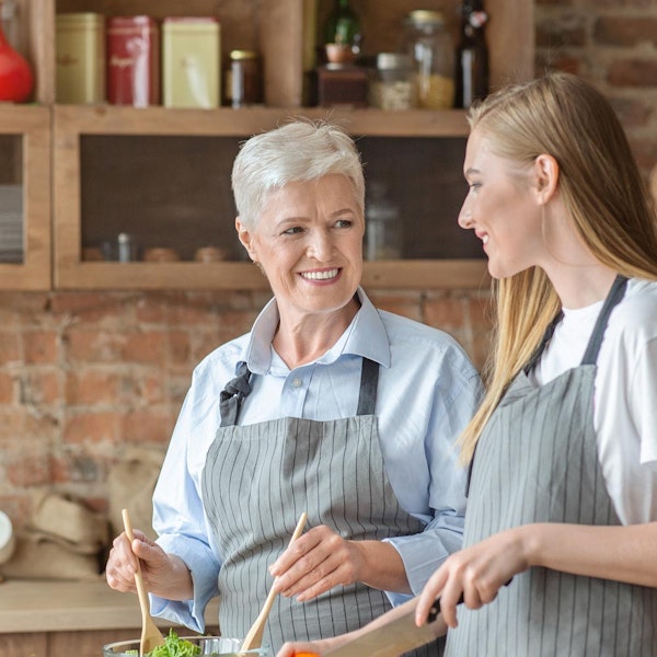 mother and daughter cooking together