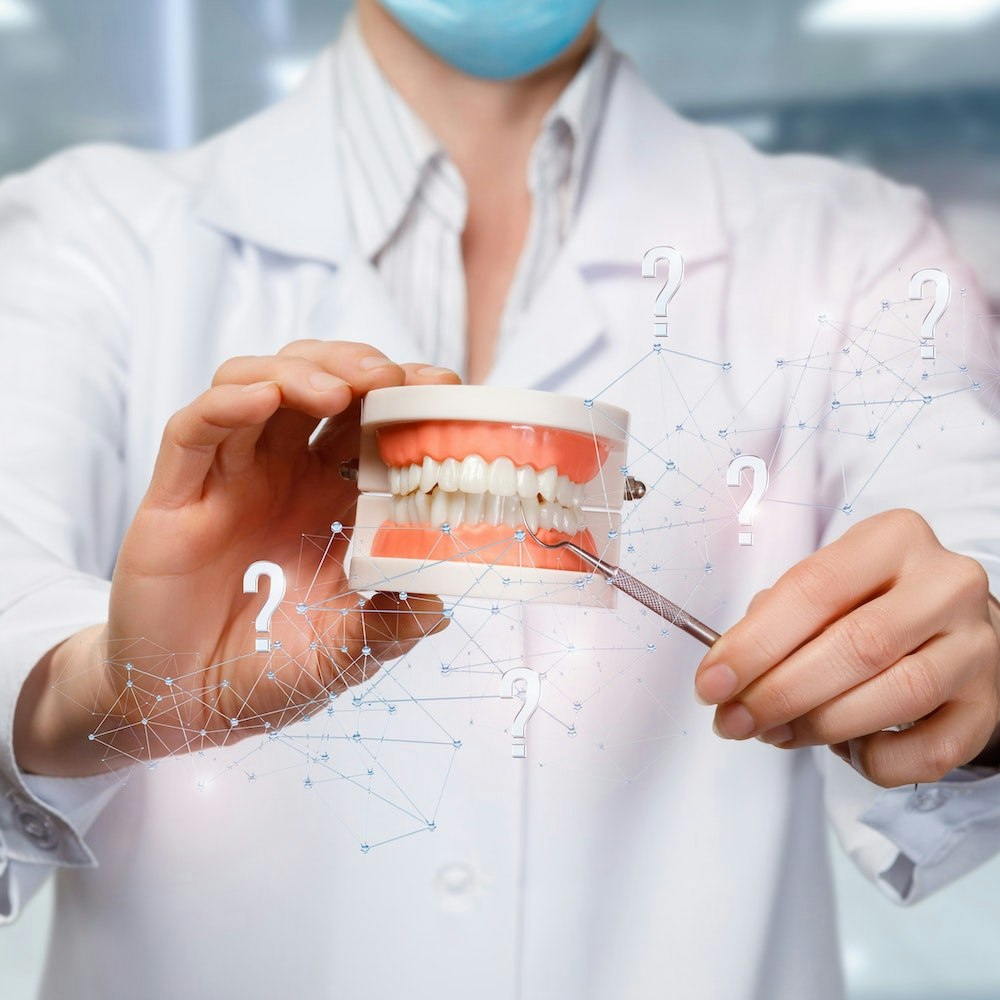 Smiling young woman after dental treatment
