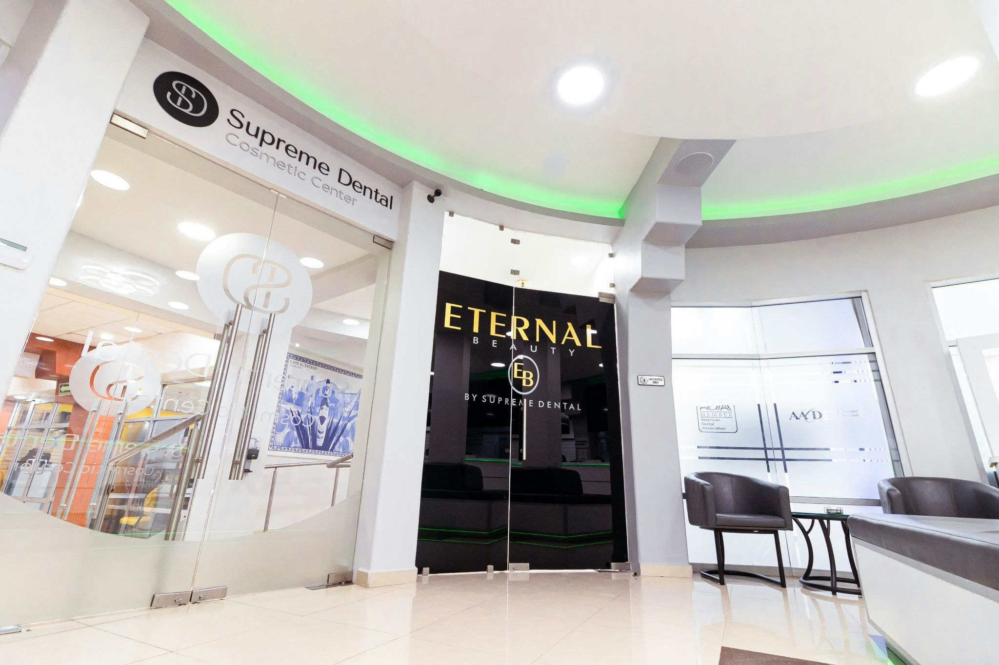 Supreme Dental Cosmetic Center door with logos