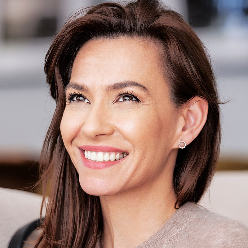 woman smiling after cosmetic dentistry