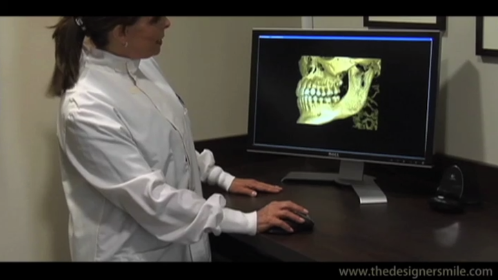 Dr. Marcy Goldin looking at an oral scan