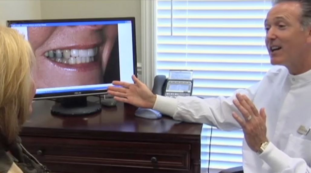 dentist talking to a patient