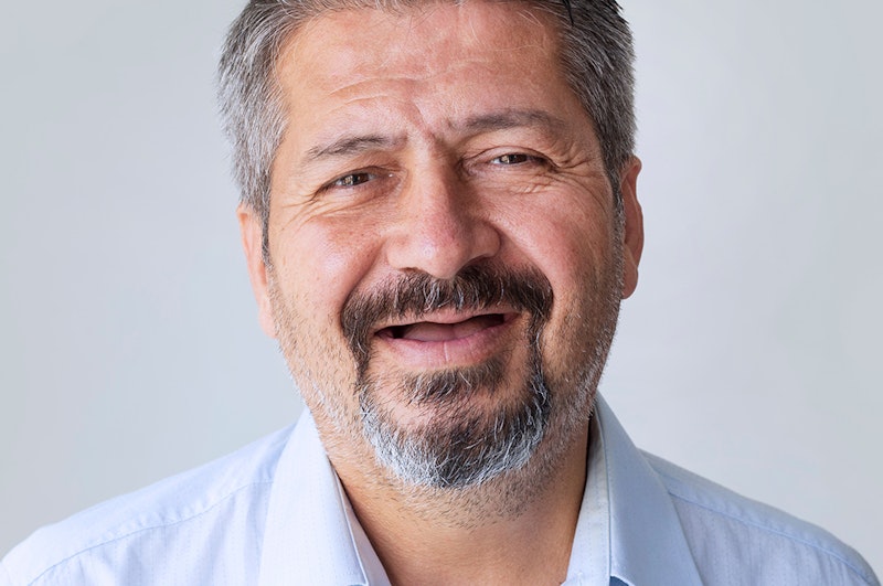 Smiling toothless man