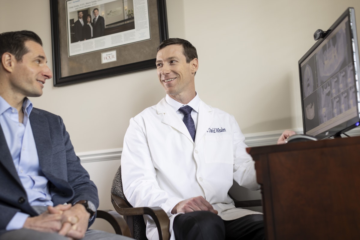 Dr. Whalen with a patient