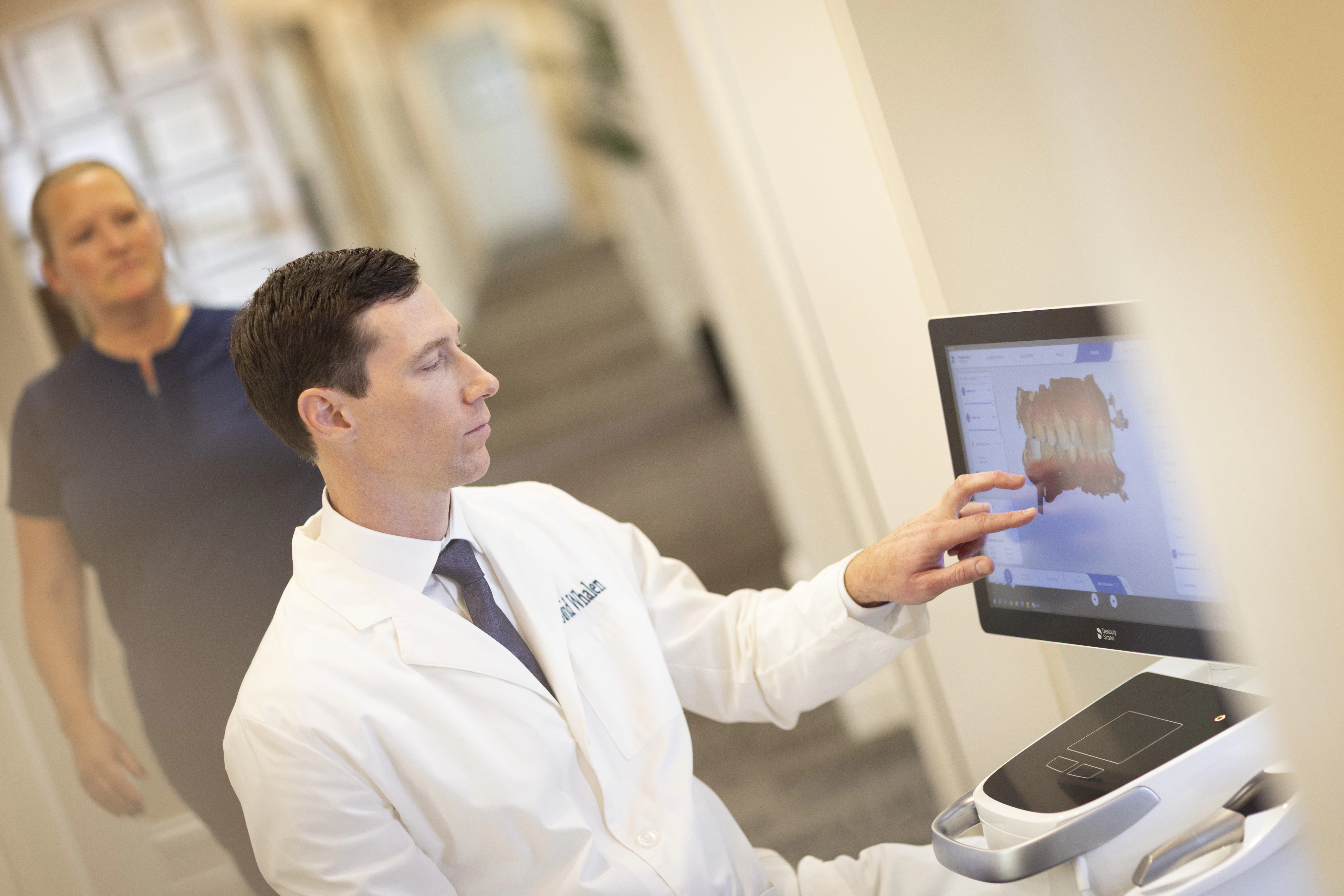 Dr. Whalen using dental software