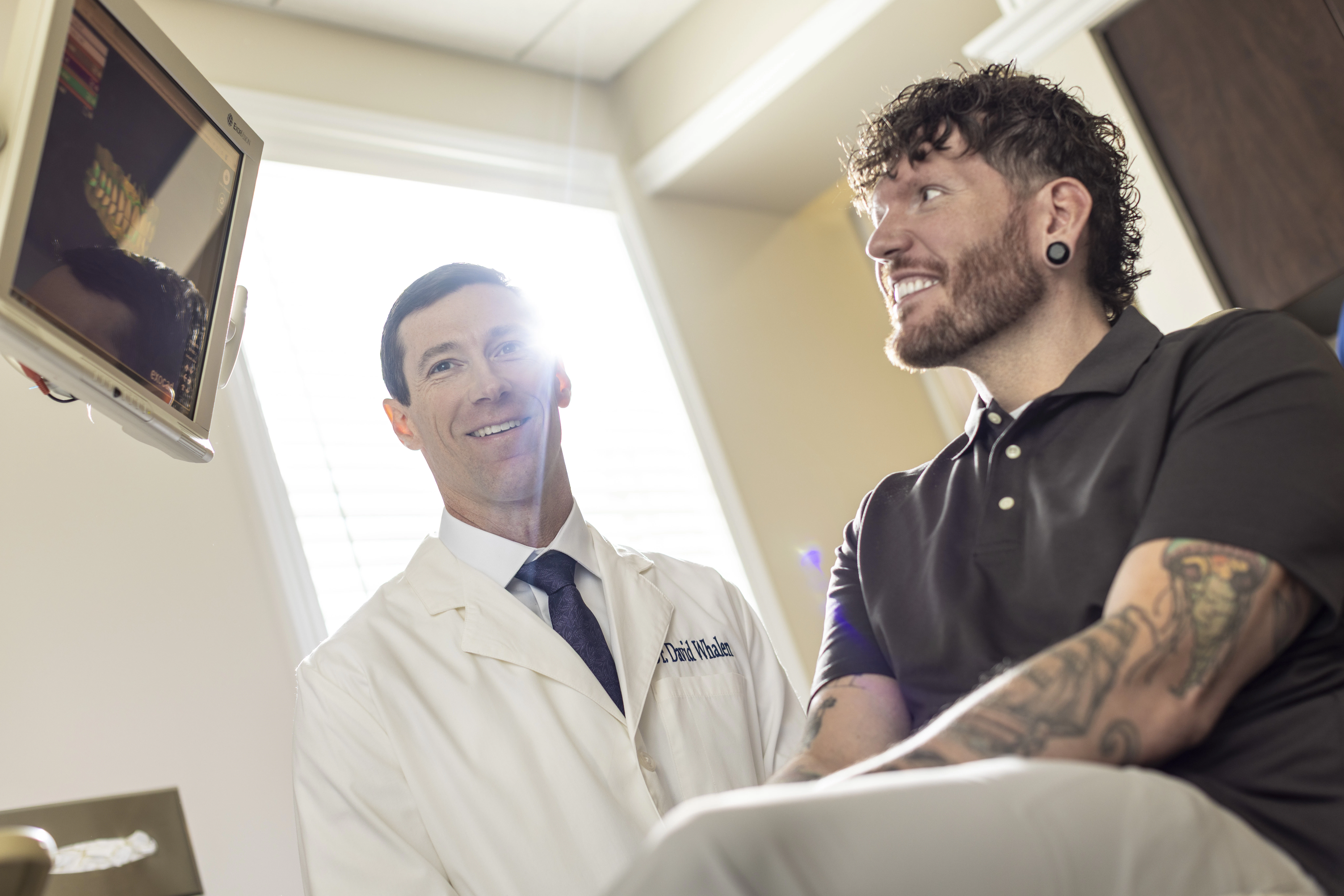 Dr. Whalen with smiling patient