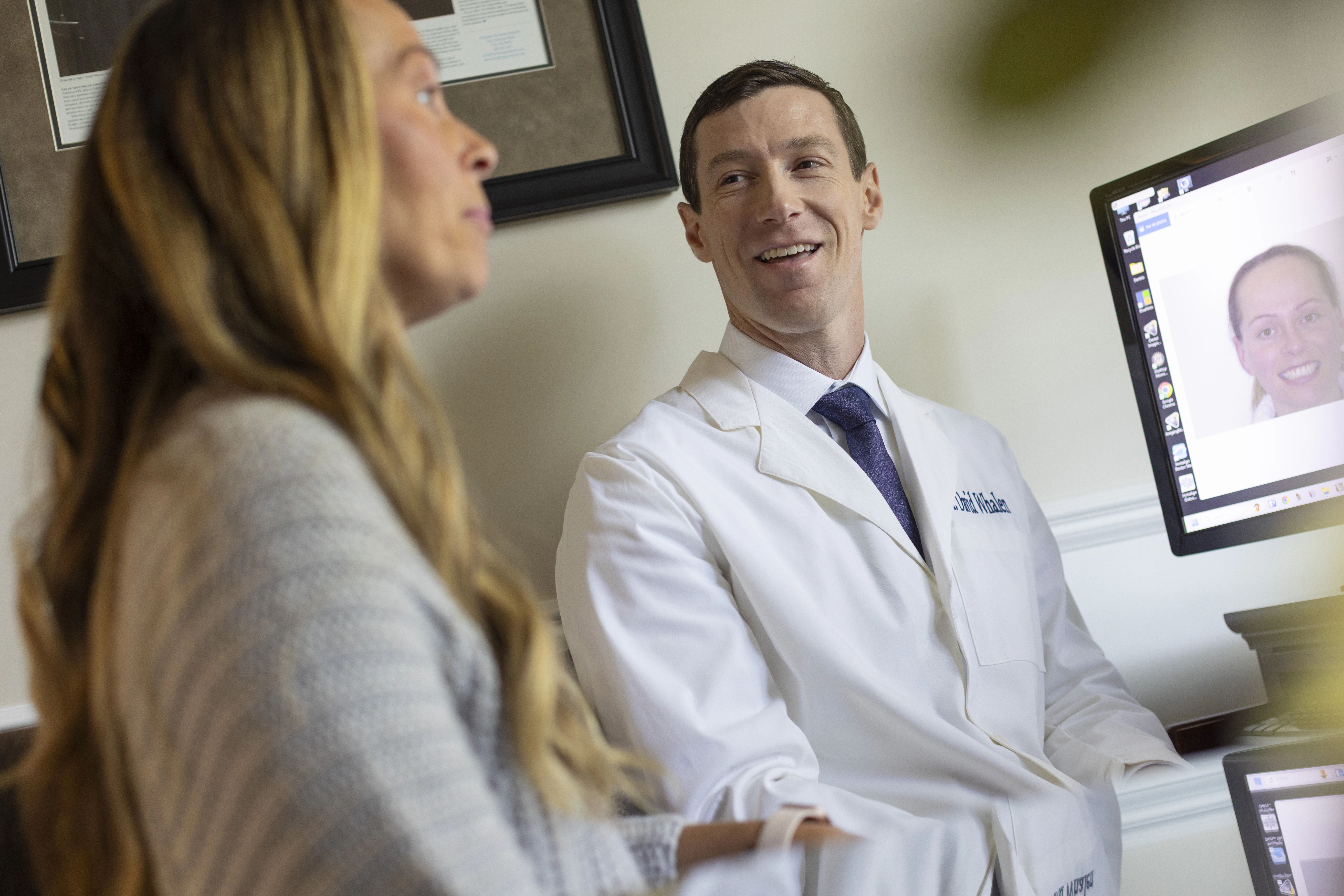 dr. whalen and a cosmetic dentistry patient