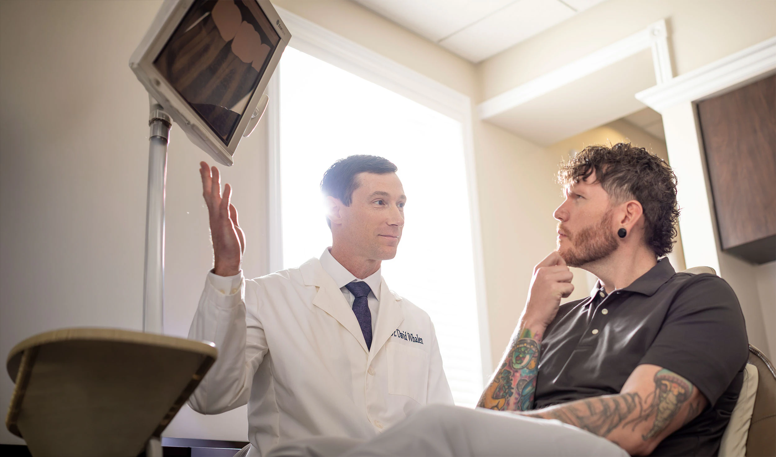 Dr. Whalen and patient during consultation