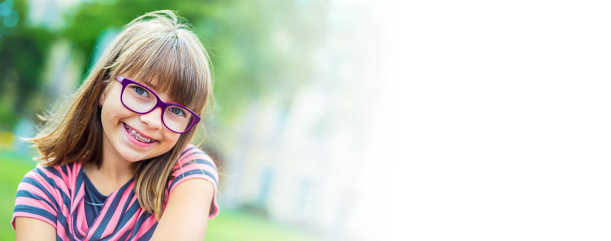 Child smiling with braces