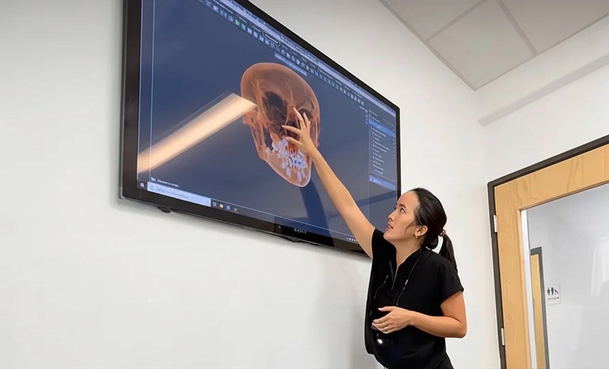 Dr. Hau reviewing cone beam scan