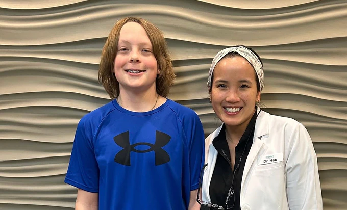 Dr. Hau with orthodontic patient