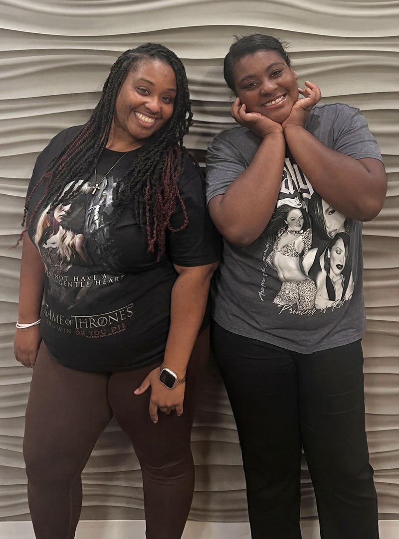 two of our patients smiling