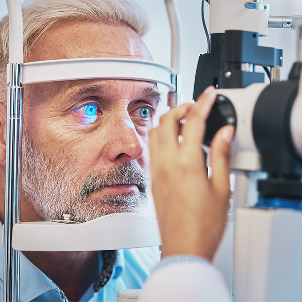 a man having his eyes checked by a doctor for glaucoma