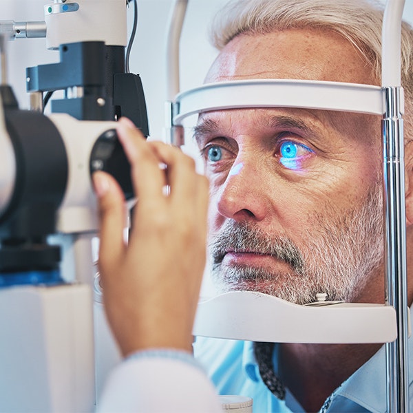 a man having his eyes checked by a doctor for glaucoma