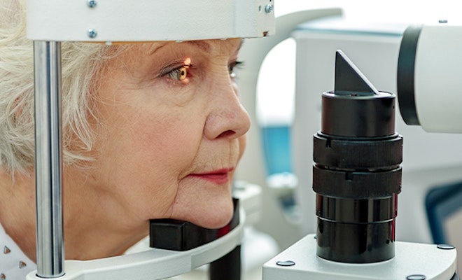 a woman having a retinal exam