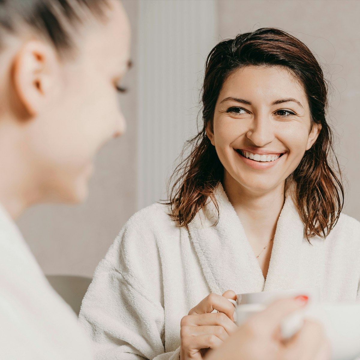 two woman conversing at spa