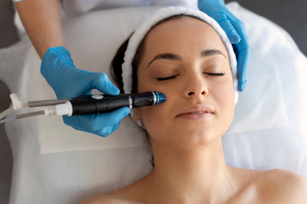 Woman getting a hydrafacial